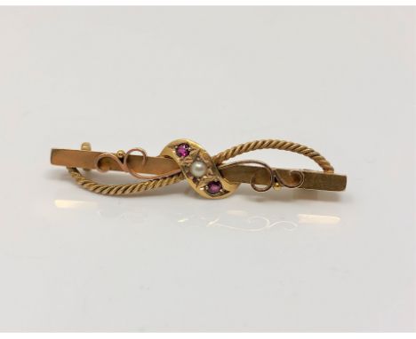 A 15ct gold ruby and pearl bar brooch CONDITION REPORT: 3.3g