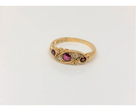 An antique 18ct gold ruby and diamond ring, size L CONDITION REPORT: 2.6g