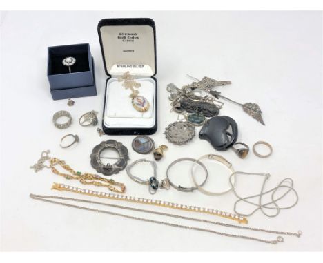 A group of silver and other jewellery including an opal ring, brooches, pendants, etc