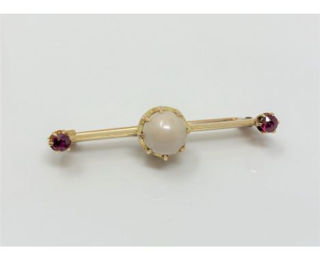 A yellow gold ruby and cultured pearl bar brooch CONDITION REPORT: Apparently unmarked. 4.5g