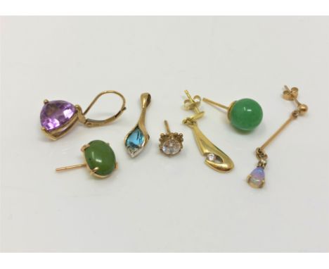 A group of gold single earrings and a pendant, set with amethyst, jade, opal and diamonds