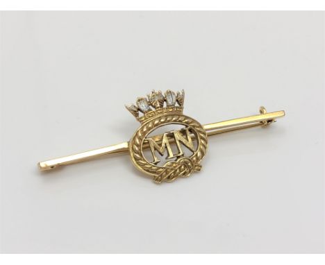A gold and enamel Merchant Navy brooch