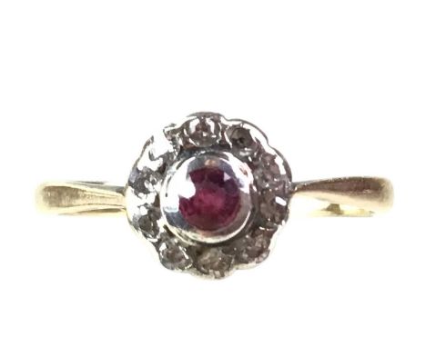 RUBY AND DIAMOND CLUSTER RING, in eighteen carat gold, size NQty: 1.9g
