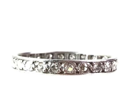 DIAMOND ETERNITY RING, set with small round brilliant cut diamonds, unmarked