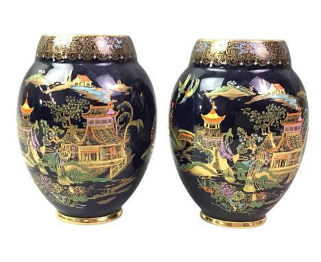 PAIR OF CARLTONWARE VASES, with gilt decoration on a blue ground14cm highQty: 2Scratches, gilding coming off some areas, no o