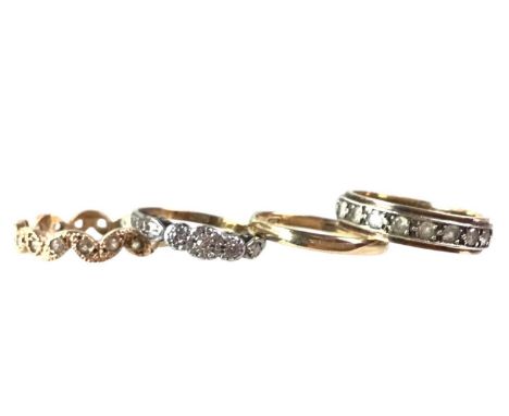 FOUR RINGS, including an eighteen carat gold diamond chip ring, two in nine carat gold and one unmarkedQty: 8.4g gross