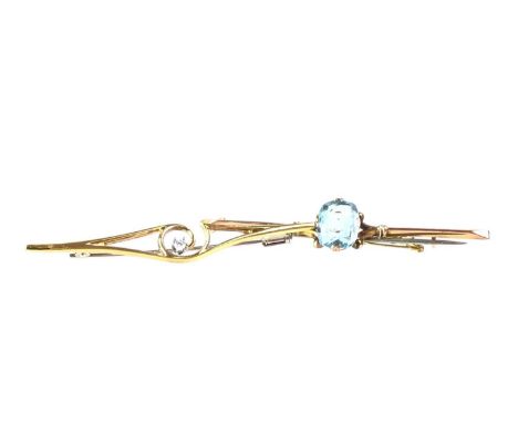 TWO GOLD BAR BROOCHES, one in nine carat gold, the other eighteen and set with a small diamond, along with a fifteen carat go