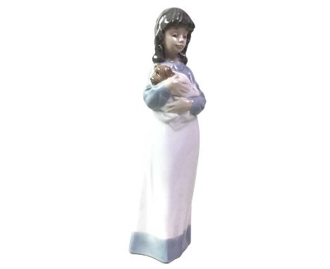 GROUP OF NAO FIGURES, including a girl with dog, another with a baby and other Nao figurestallest 27cm high