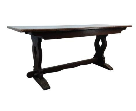 OAK REFECTORY TABLE, EARLY / MID 20TH CENTURY of rectangular form with lyre style ends183cm long76cm high, 76cm deep. Well us