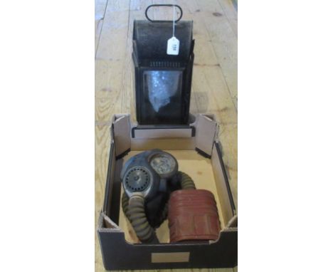 A service respirator, together with a metal carriage lantern.