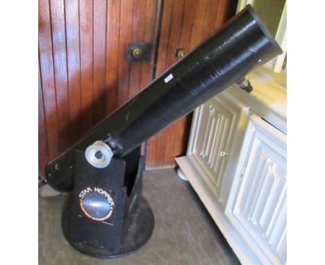 A Star Hopper Celestron International Telescope.