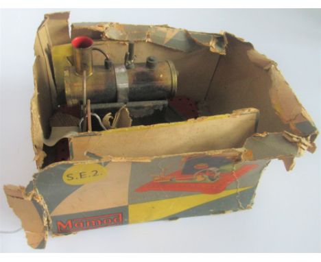 A Mamod stationery steam engine and tools.