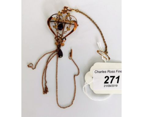 A late Victorian rose gold amethyst and seed pearl set brooch/pendant of stylized form, with safety chain, together with a fi