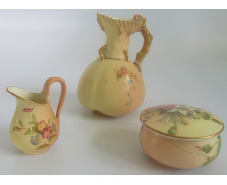 A Royal Worcester blush ivory ewer, together with a small jug and powder pot.