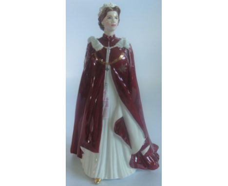 A Royal Worcester figurine, in celebration of the Queen's 80th birthday 2006, dressed in the robes of the Order of the Britis