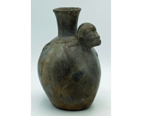 An excellent Chimu-Inca zoomorphic vessel from Peru, ca. 1400 - 1500 AD. This large bottle features a nicely detailed monkey 