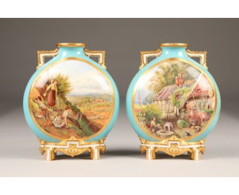 Pair 19th century Royal Worcester moon flask vases, powder blue with hand painted figures in landscapes, moulded Worcester ma