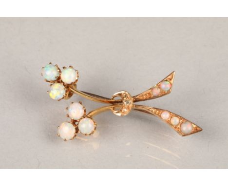 15 carat gold opal brooch of stylised floral form, length 36mm, weight 3gCONDITION REPORT:The brooch is in very good conditio