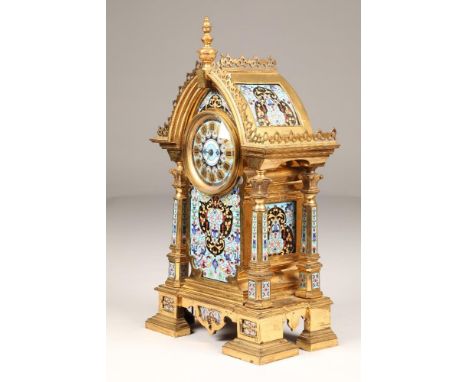 French ormolu and champleve enamel gothic style table clock, top with pierced gallery, circular dial, black roman numerals, f