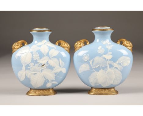 Pair Royal Worcester moon flask vases, decorated with flowering plants, raised on gilt bases with Greek key decorating , date