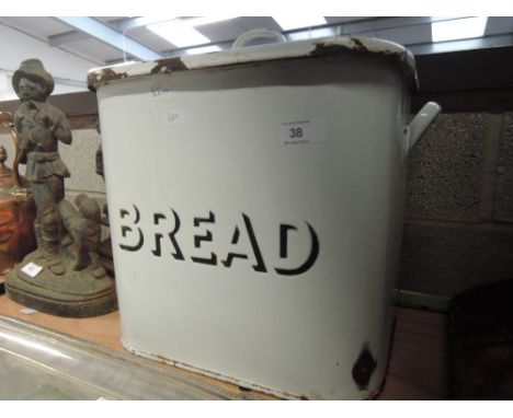 A vintage enamel bread bin