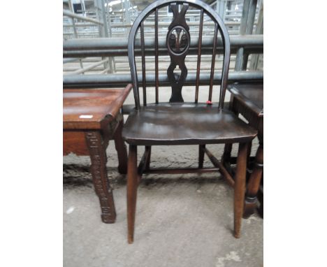 An Ercol style hoop and stick back kitchen chair