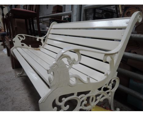 A vintage garden bench having cast ends