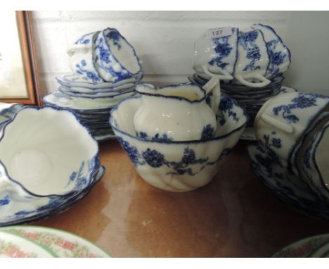 A part vintage tea service in flute design with blue floral garland design