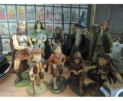 A collection of Lord of the Rings figurines