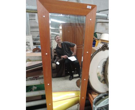 A vintage 1970's design teak framed full length wall mirror