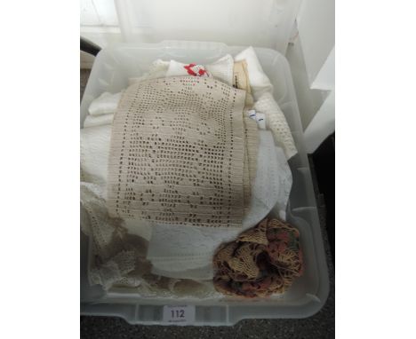 A box of vintage linen