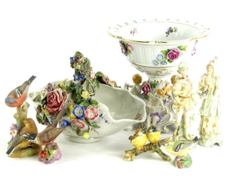 A German porcelain centrepiece, in the manner of Meissen decorated with putti, flowers, etc., a similar basket shaped centrep