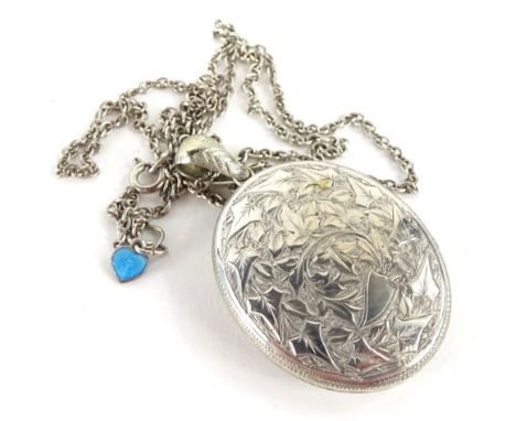 A modern silver pendant locket and chain, the locket heavily florally engraved, on a fine link chain, the pendant 4cm H, with