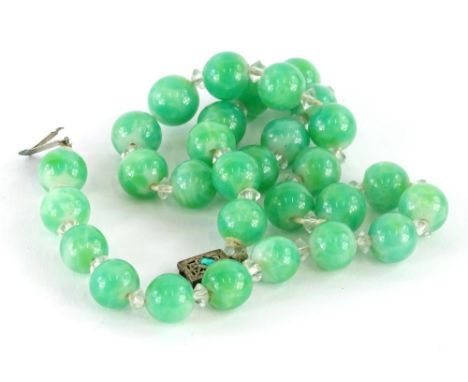 A green glass bead jade effect necklace.