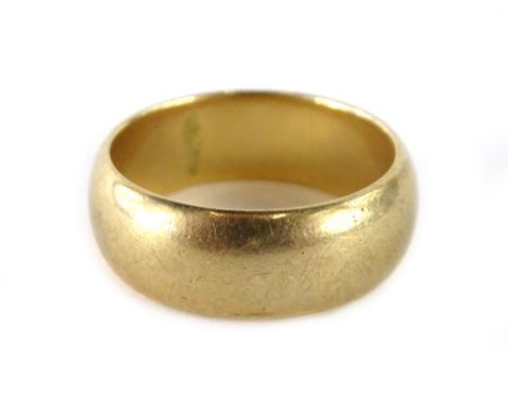 A 9ct gold wedding band, of plain design, with makers stamp K&amp;Co, ring size W, 11.2g.