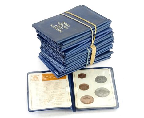 Ten blue plastic folders, containing Britians first decimal coins.