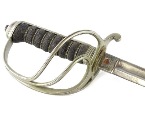 An 1857 pattern British artillery officer's dress sword, with steel scabbard, the engraved blade stamped 7488, and with a pie