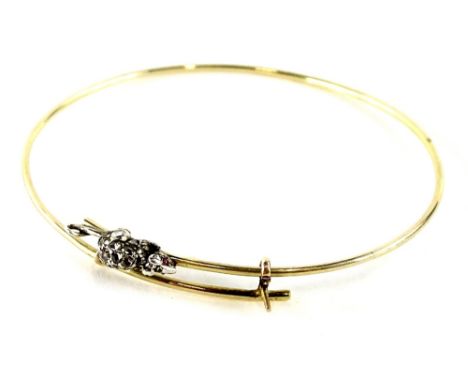 A mouse design bangle, set with single marcasite set mouse, with garnet eyes on yellow metal expanding bracelet, the mouse 1.