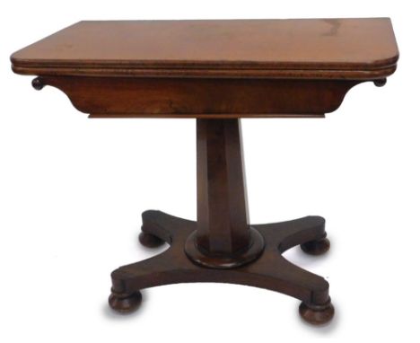 A Victorian mahogany card table, the rectangular top with rounded corners, enclosing a circular base interior, on an octagona