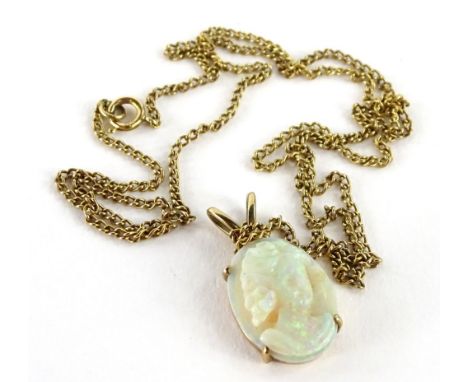 A 9ct gold pendant and chain, the pendant set with carved opal depicting a maiden, with v shaped clasp, the pendant 1.5cm H, 
