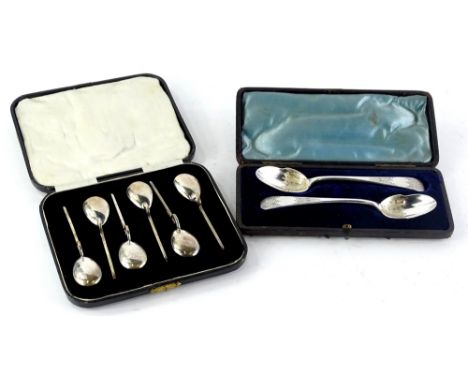 A set of six silver reproduction Roman tools, each with a shaped handle and bowl, Sheffield 1979 and a pair of silver plated 