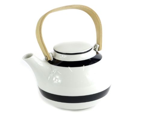 A Kahler porcelain teapot, with bentwood handle, 20cm W.
