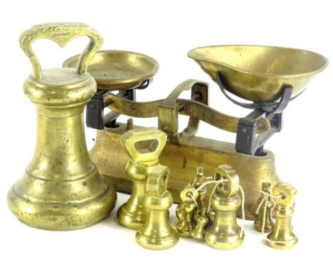An associated set of bell weights, to include 14lbs and a set of scales.