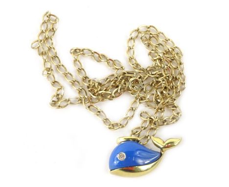 An 18ct gold whale pendant and chain, the whale with blue enamel design top and tiny diamonds set eye, on modern link 9ct gol