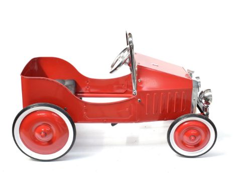 A Child's Red Metal 1930's Style Pedal Car, modern, with plastic steering wheel, moulded seat, chromed metal rollbar, headlam