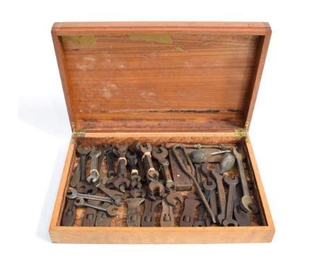 A Wooden Box, containing an assortment of vintage double-ended spanners and adjustable gauges