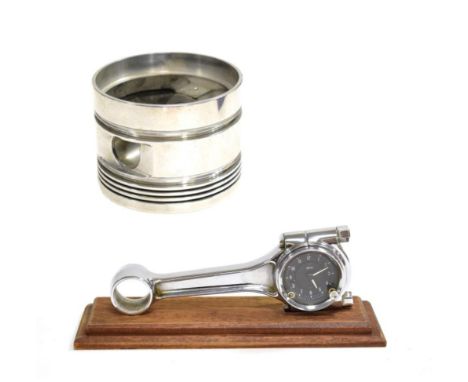 A Stainless Steel Spitfire Piston, 13.5cm diameter; and A Stainless Steel Connrod's Connecting Rod, a prototype for the first