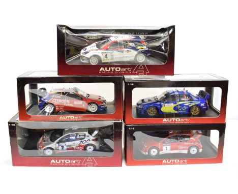 Autoart World Rally Championship Group 1:18 scale models: Ford Focus RS, Peugeot 206, another similar, Subaru Impreza and Cit