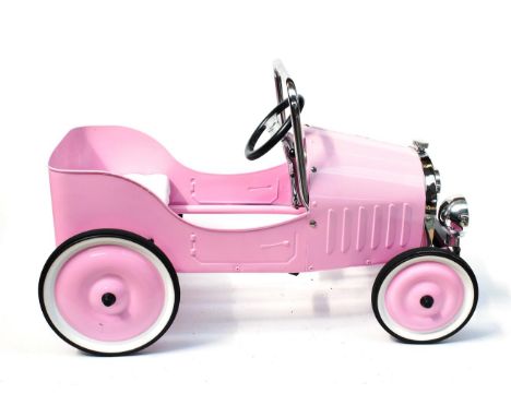 A Child's Pink Metal 1930's Style Pedal Car, modern, with plastic steering wheel, moulded seat, chromed metal rollbar, headla