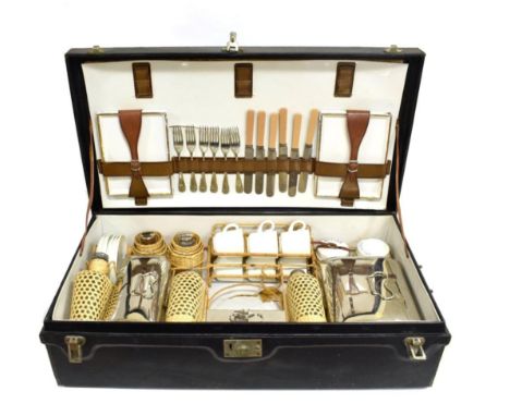 A 1930/40 Six Place Setting Hamper, with black outer case initialled WGK, enclosing a fitted interior with chromed and china 